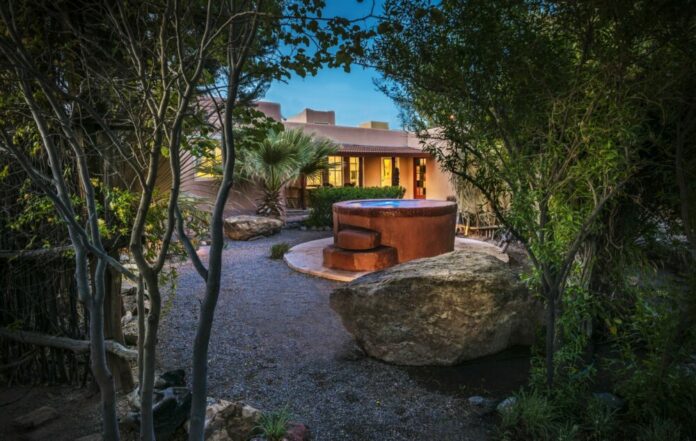 SGL+Casita+Exterior+with+Private+Hot+Springs+Tub+Dusk A casitas with private hot springs tub at Sierra Grande Lodge & Spa.