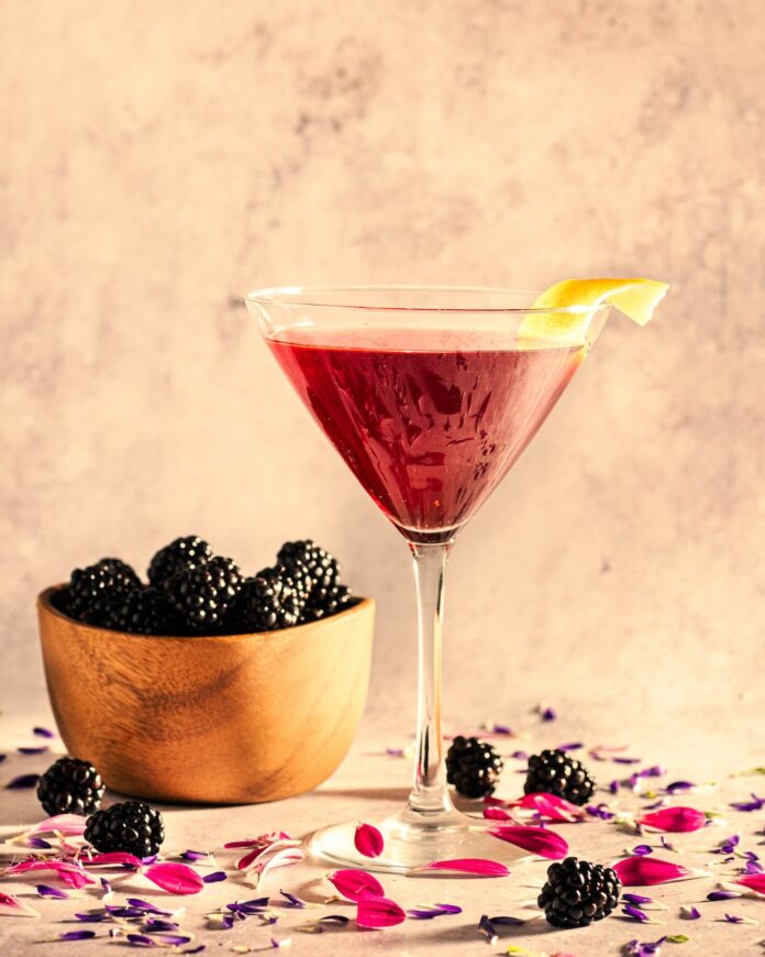 martini glass with blackberries