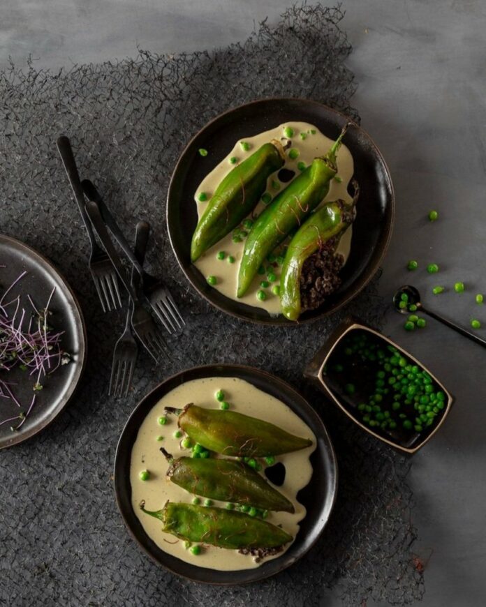 Acclaimed Chef John Sedlar elevates traditional fire-roasted green chile rellenos with French inspiration.