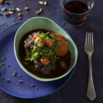 Slow-Cooked Oxtail Dish with Jamaican Jerk Seasoning, Rosemary, Thyme, and Cinnamon