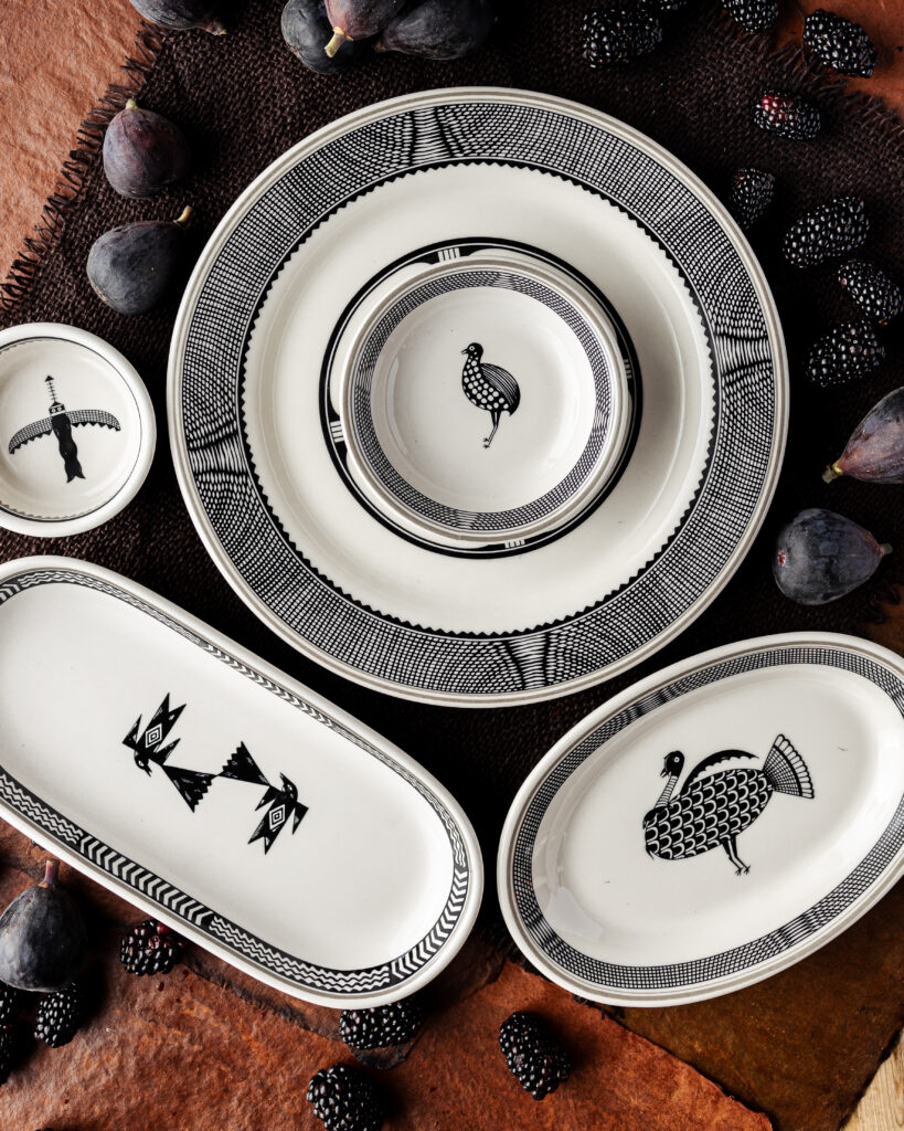 Mimbreño dinnerware, white with dark grey patterns on them.