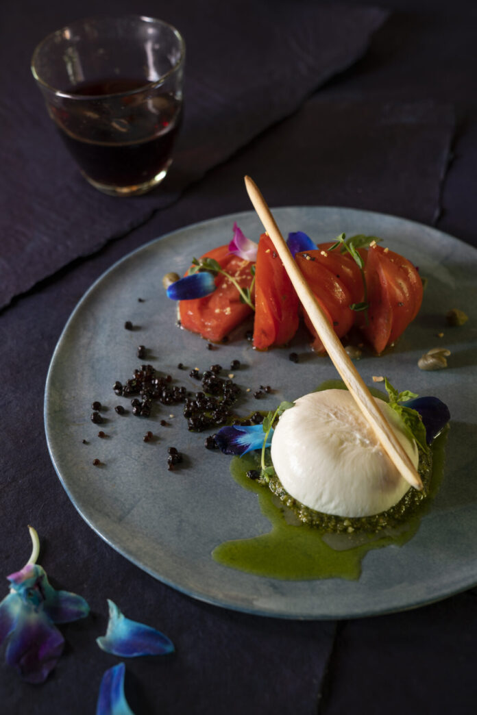 Burrata Caprese Recipe with Heirloom Tomatoes, Burrata, Tangerine Juice, and Balsamic Pearls