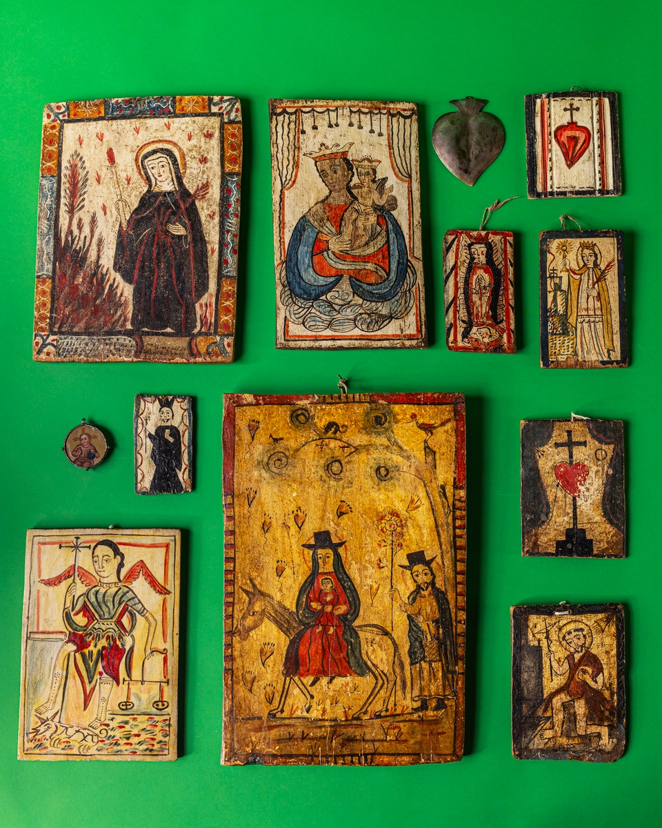 Collection of vintage religious icons on a green background, featuring figures of saints and biblical scenes.