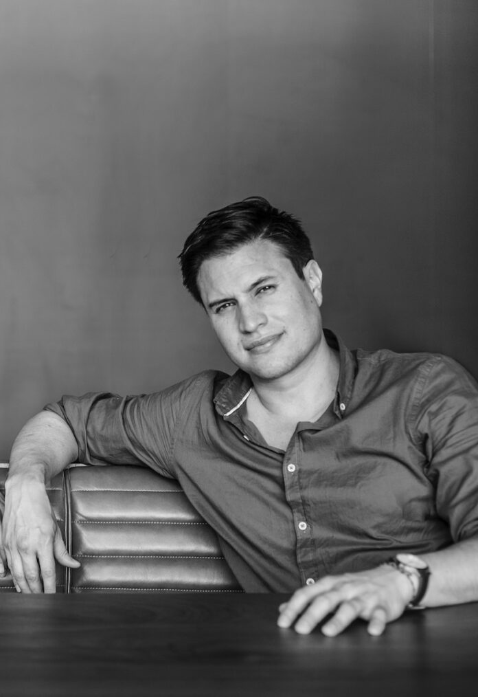 A black and white image of New Mexico bartender Lucas Swallows