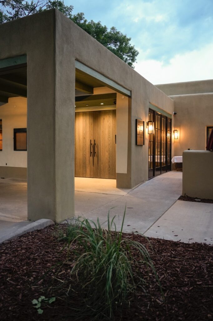 The outside entrance of Market Street Steakhouse in rectangular shapes with warm lighting.