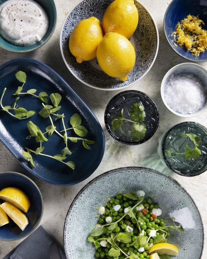 A set of plates of peas with soffritto.