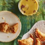 Thandai staged with gujiyas, a sweet Indian treat for Holi