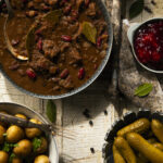 A hearty beef stew (kalops) with kidney beans and bay leaves.