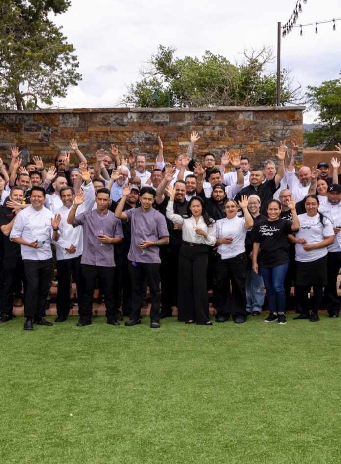 A group of chefs in the class photo of the Santa Fe Wine and Chile 2025 participants.