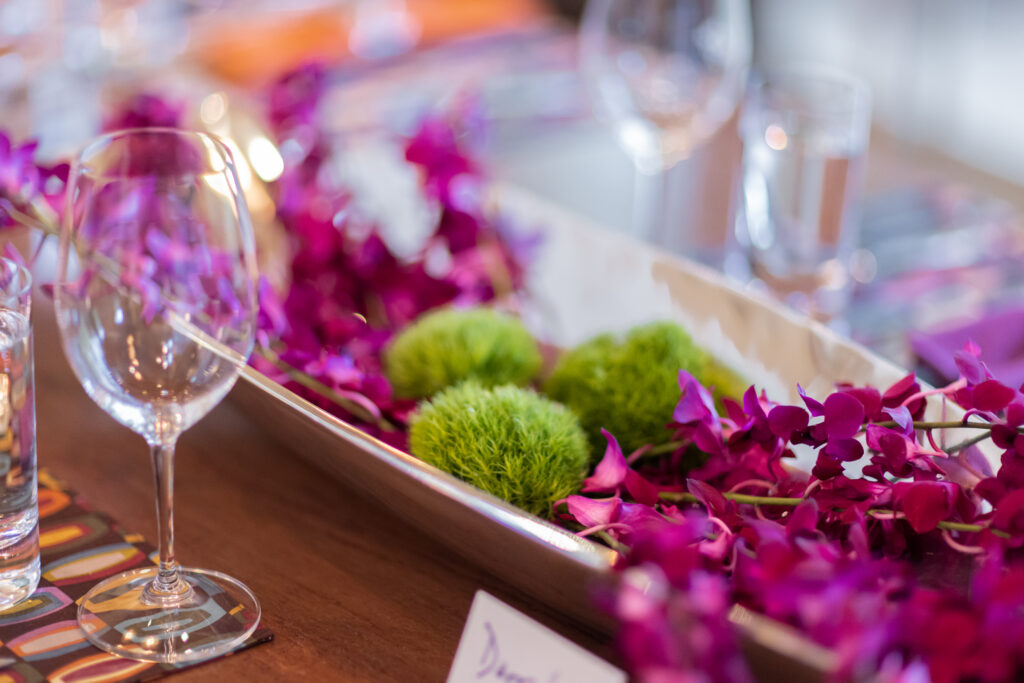 oval white bowl with purple decorative flowers