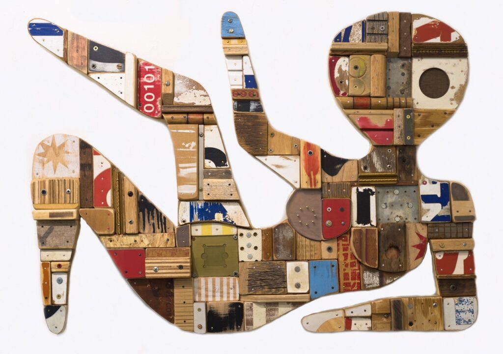 The outline of a person made from a collage of patterns.