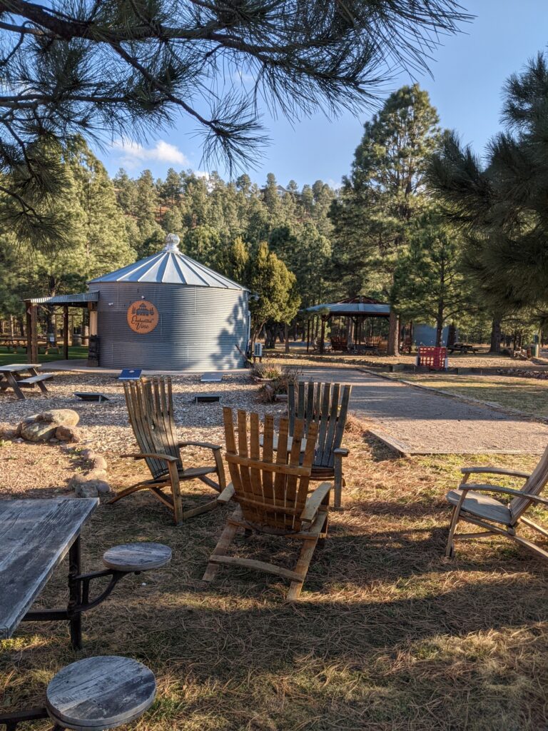 winery outside with wooden chairs and large tin room