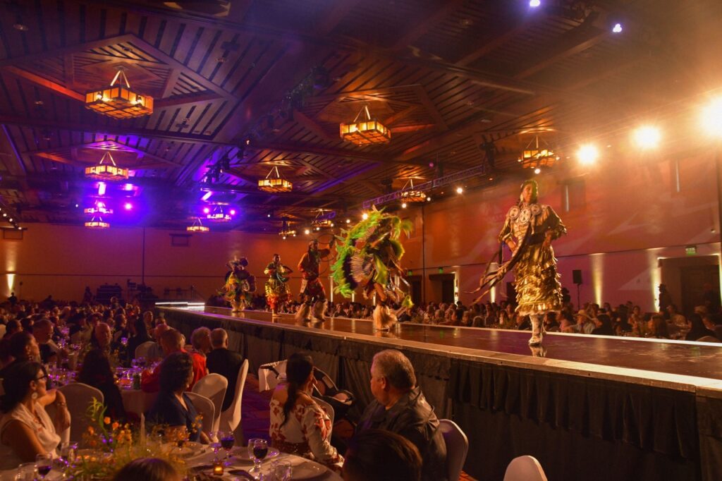 Santa Fe Indian Market 2025 Recap TABLE Magazine 6 Native dancers perform on a runway.