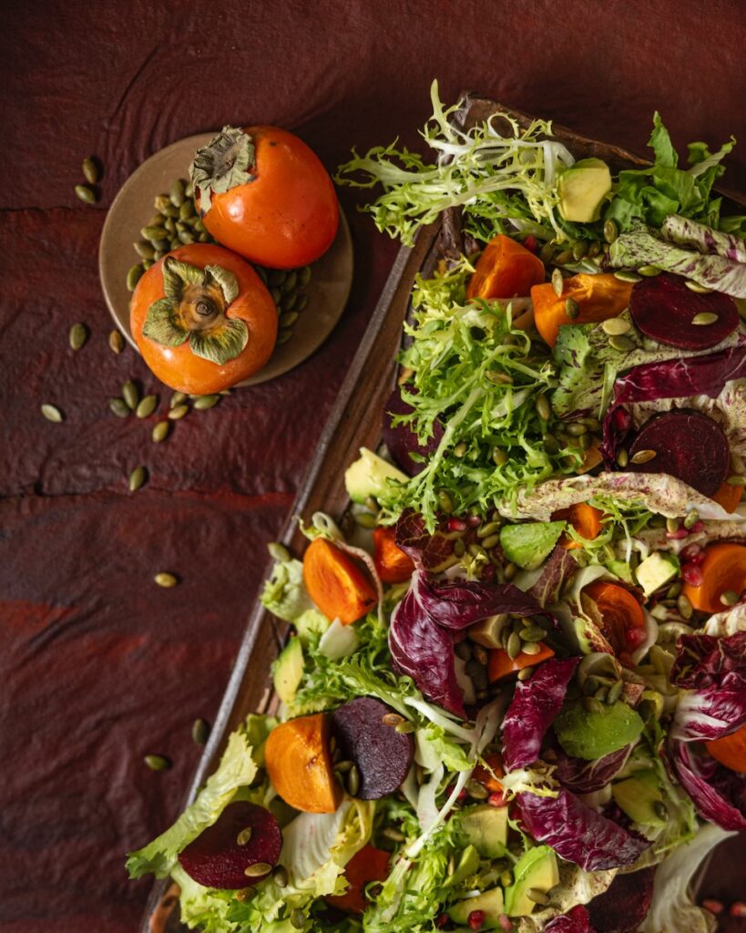 Colorful salad with tomatoes on side