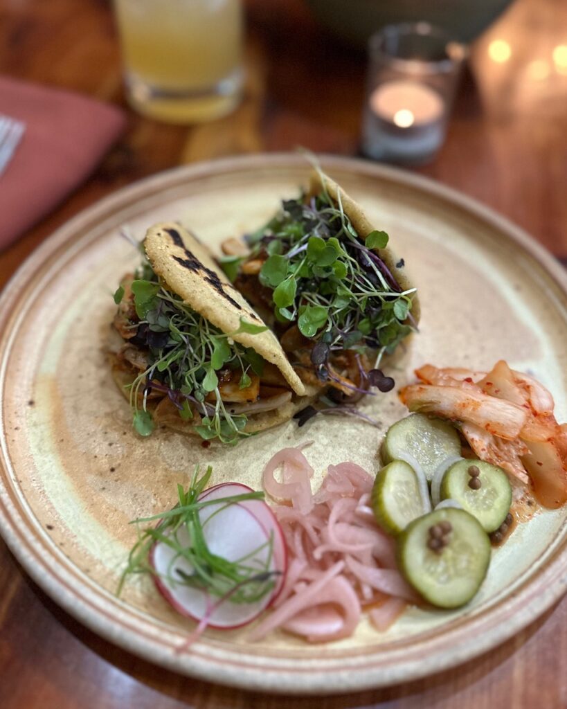A plate full of mushroom gorditas from Tumbleroot Table.