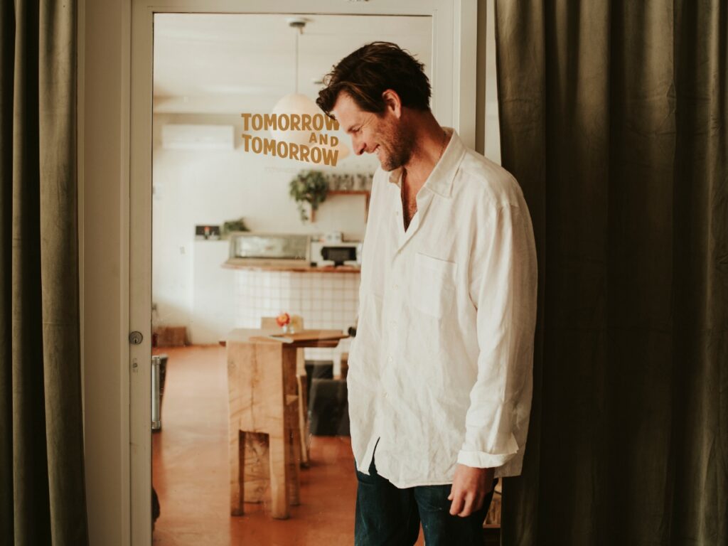 Matt Burns standing in the doorway of Tomorrow and Tomorrow bakery and cafe in Taos.