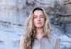 Shop New Mexico for Summer Fashion and Home Decor A woman in a long grey wash button shirt.