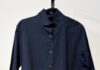 Santa Fe Summer Shopping: Five Artisan Finds from Local Boutiques and Designers A long dark blue button up with a pattern at the bottom.