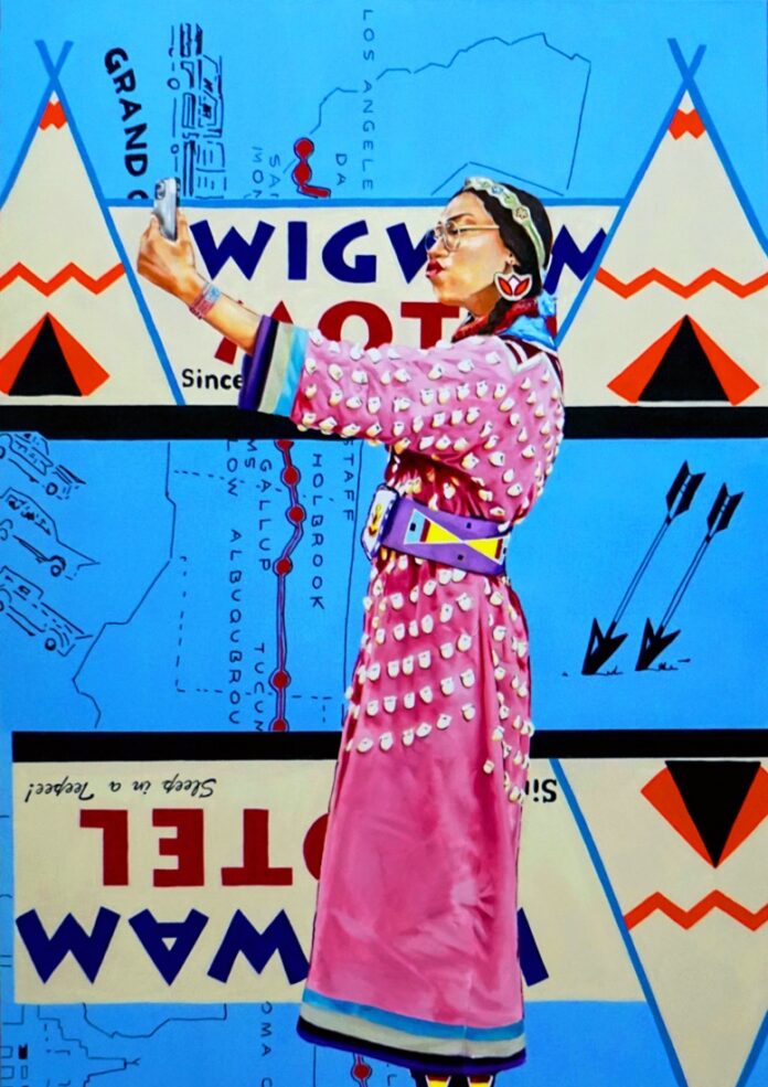 A native person in long pink robes in front of a blue background with tent illustrations.