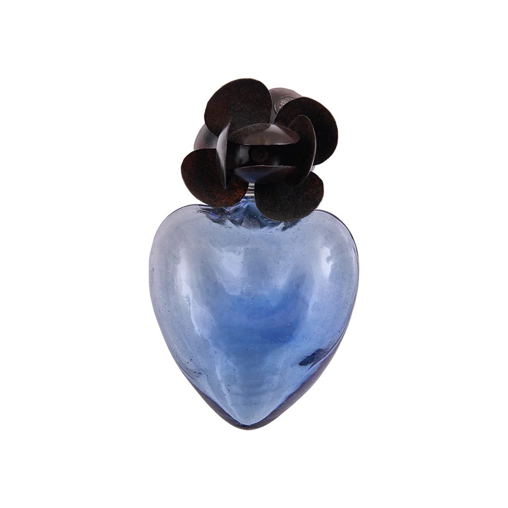 A mouthblown blue heart pendant.