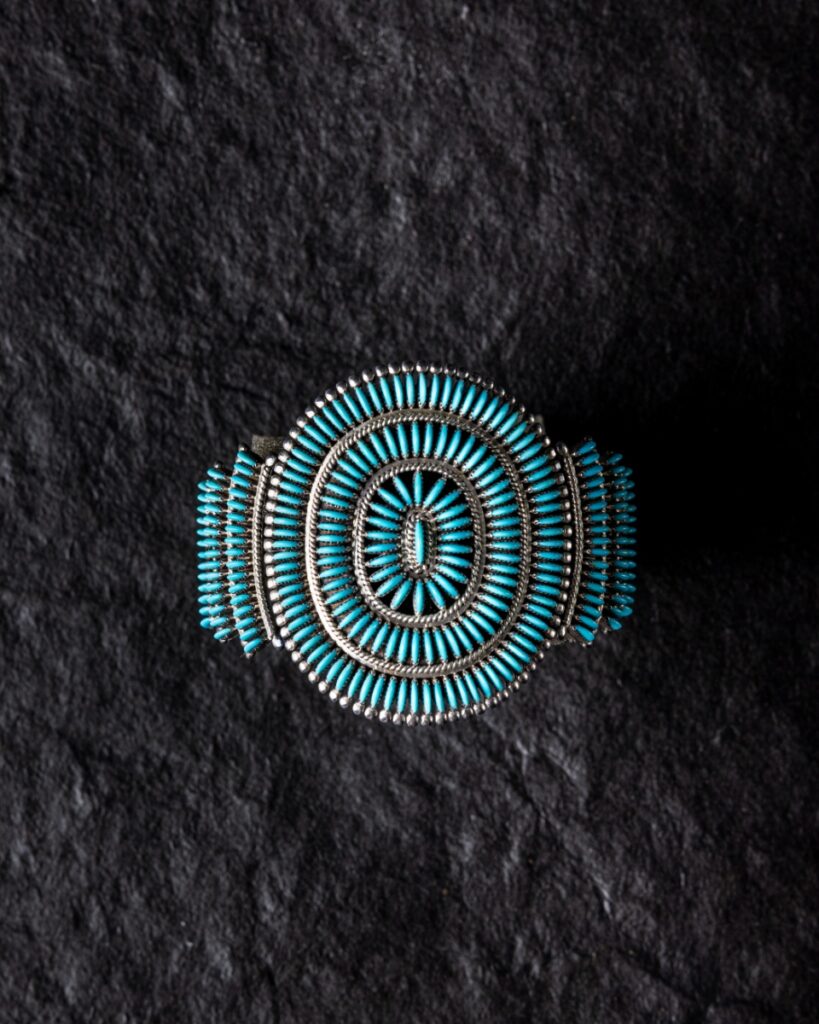 Zuni needlepoint turquoise silver cuff bracelet crafted by master jeweler Edith Tsabetsaye.